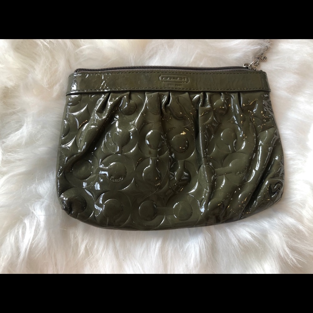 Dark grey patent leather Coach wristlet